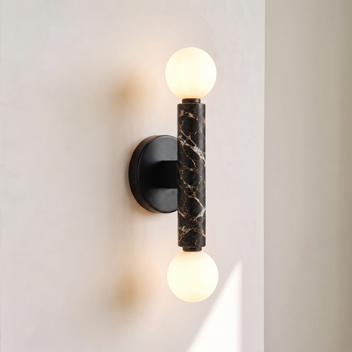 Baton Dual Globe Sconce - Nero Portoro, a black circular backplate, a central black marble cylinder with gold veining, and two matte white spherical shades on either end | IINK Interiors