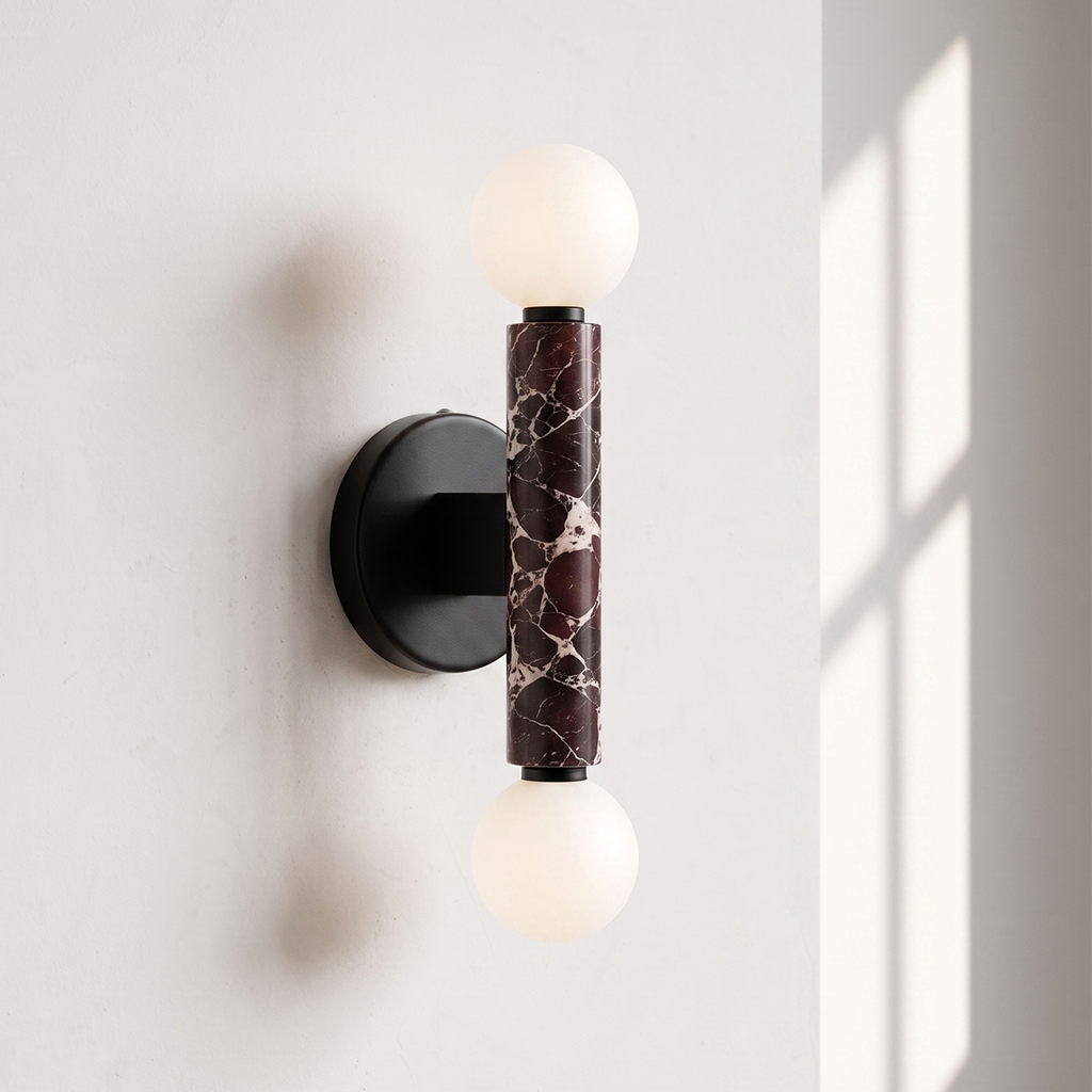 Baton Dual Globe Sconce - Rosso Levanto- two glowing white globe bulbs and a central dark marble column | IINK Interiors