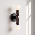 Baton Dual Globe Sconce - Rosso Levanto- two glowing white globe bulbs and a central dark marble column | IINK Interiors
