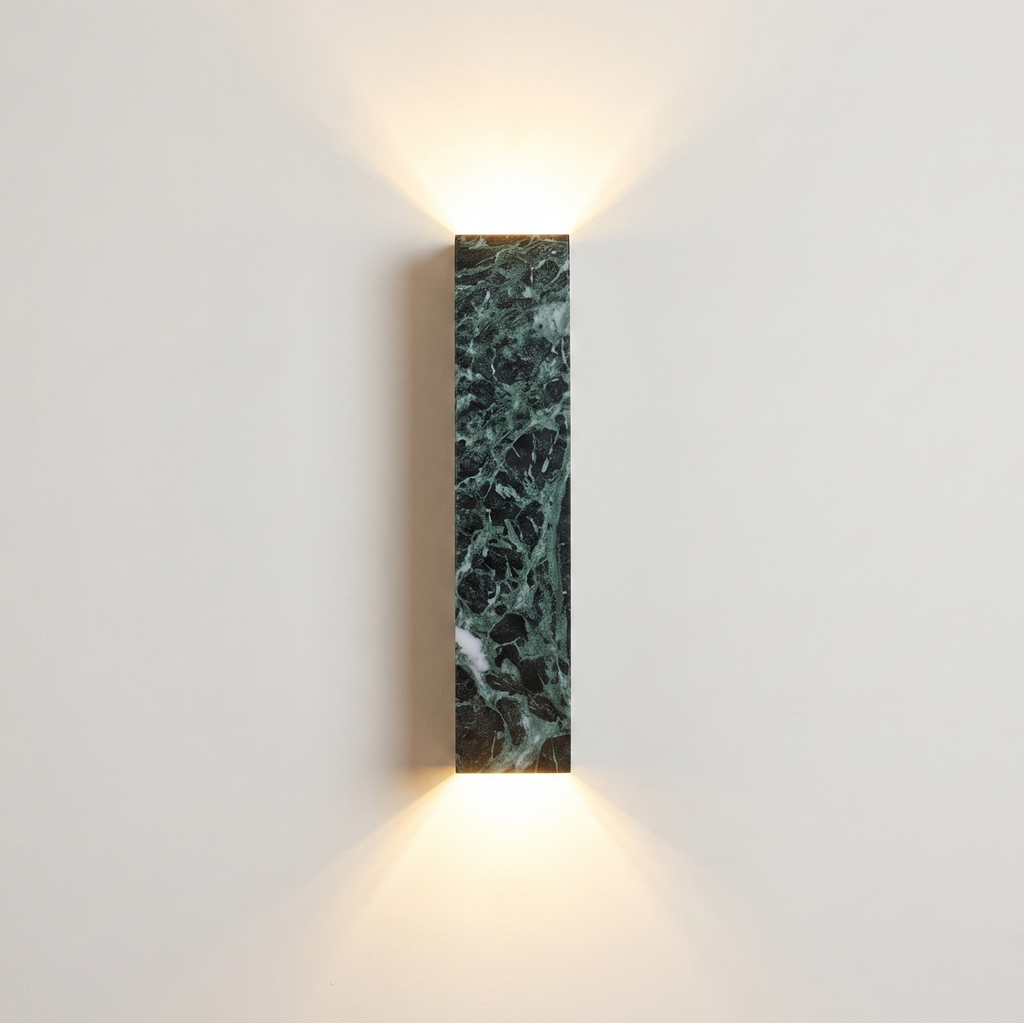 A Verdi Alpi Marble Sconce with a matte finish, this rectangular wall light adds a touch of sophistication to living rooms | IINK Interiors