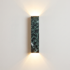 A Verdi Alpi Marble Sconce with a matte finish, this rectangular wall light adds a touch of sophistication to living rooms | IINK Interiors