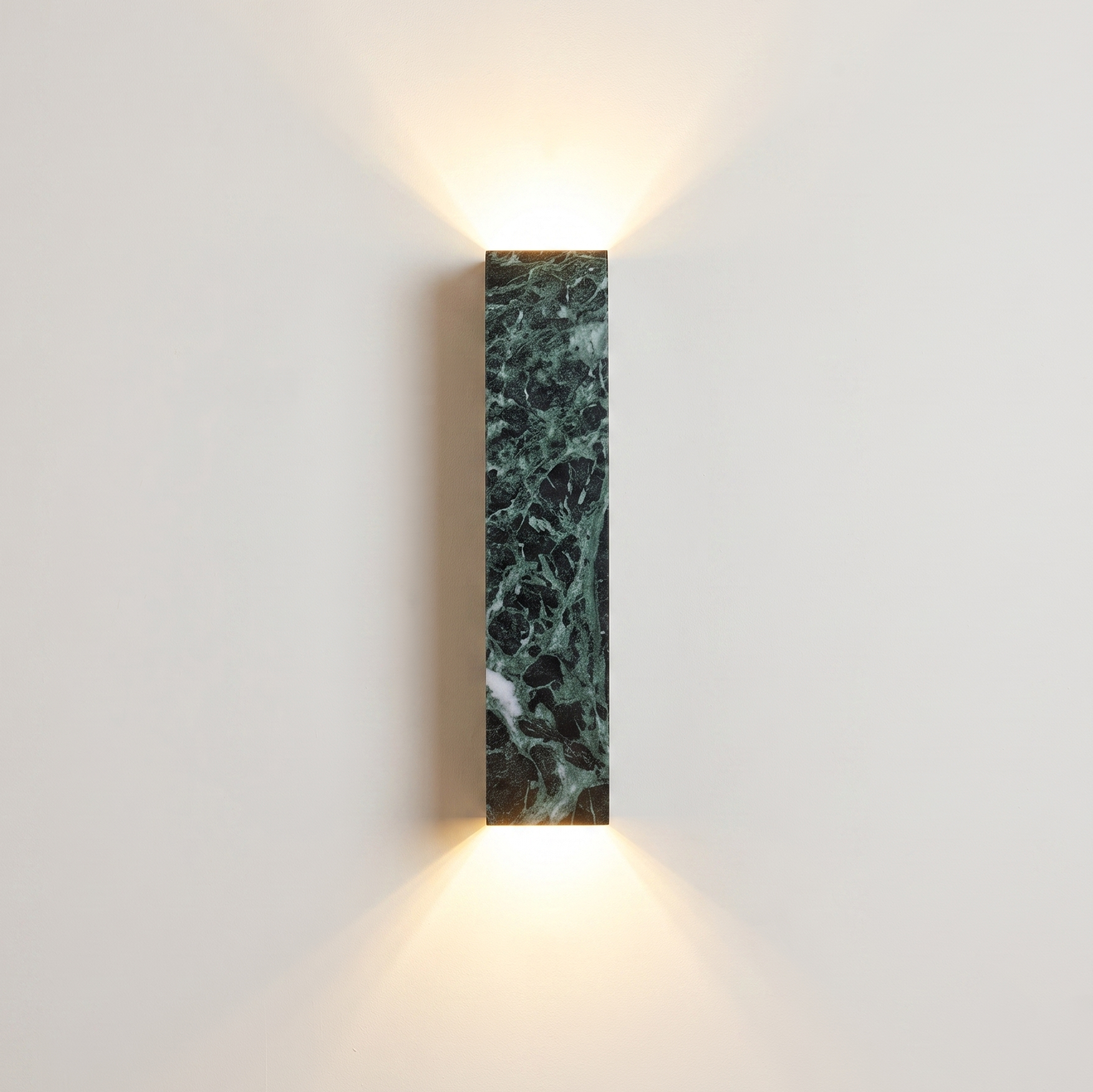 A Verdi Alpi Marble Sconce with a matte finish, this rectangular wall light adds a touch of sophistication to living rooms | IINK Interiors