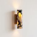 Up and down tube Sconce - Calacatta Viola- A modern wall-mounted sconce with a cylindrical marble shade featuring black and cream veining | IINK Interiors