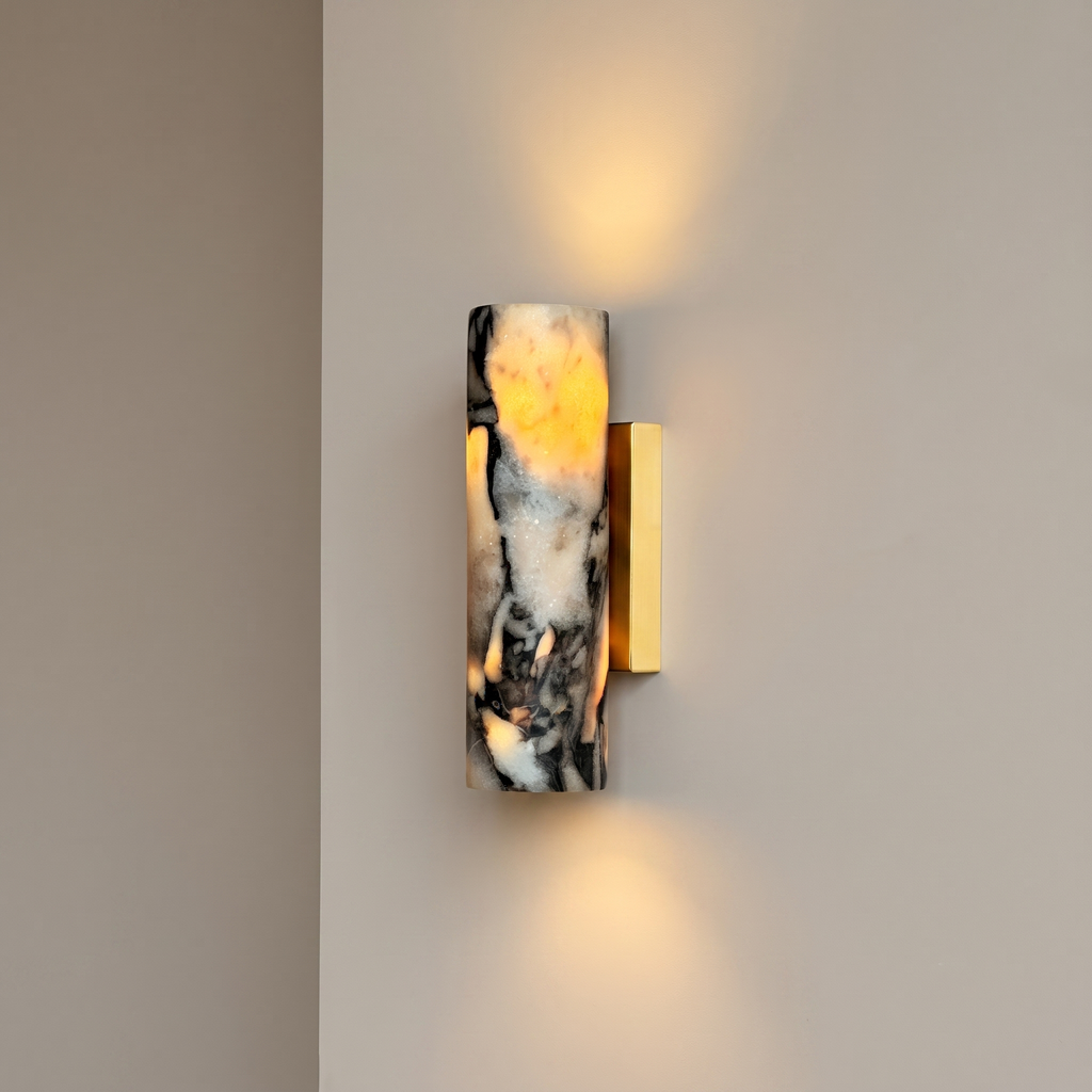 Up and down tube Sconce - Calacatta Viola- A modern wall-mounted sconce with a cylindrical marble shade featuring black and cream veining | IINK Interiors