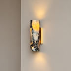 Up and down tube Sconce - Calacatta Viola- A modern wall-mounted sconce with a cylindrical marble shade featuring black and cream veining | IINK Interiors