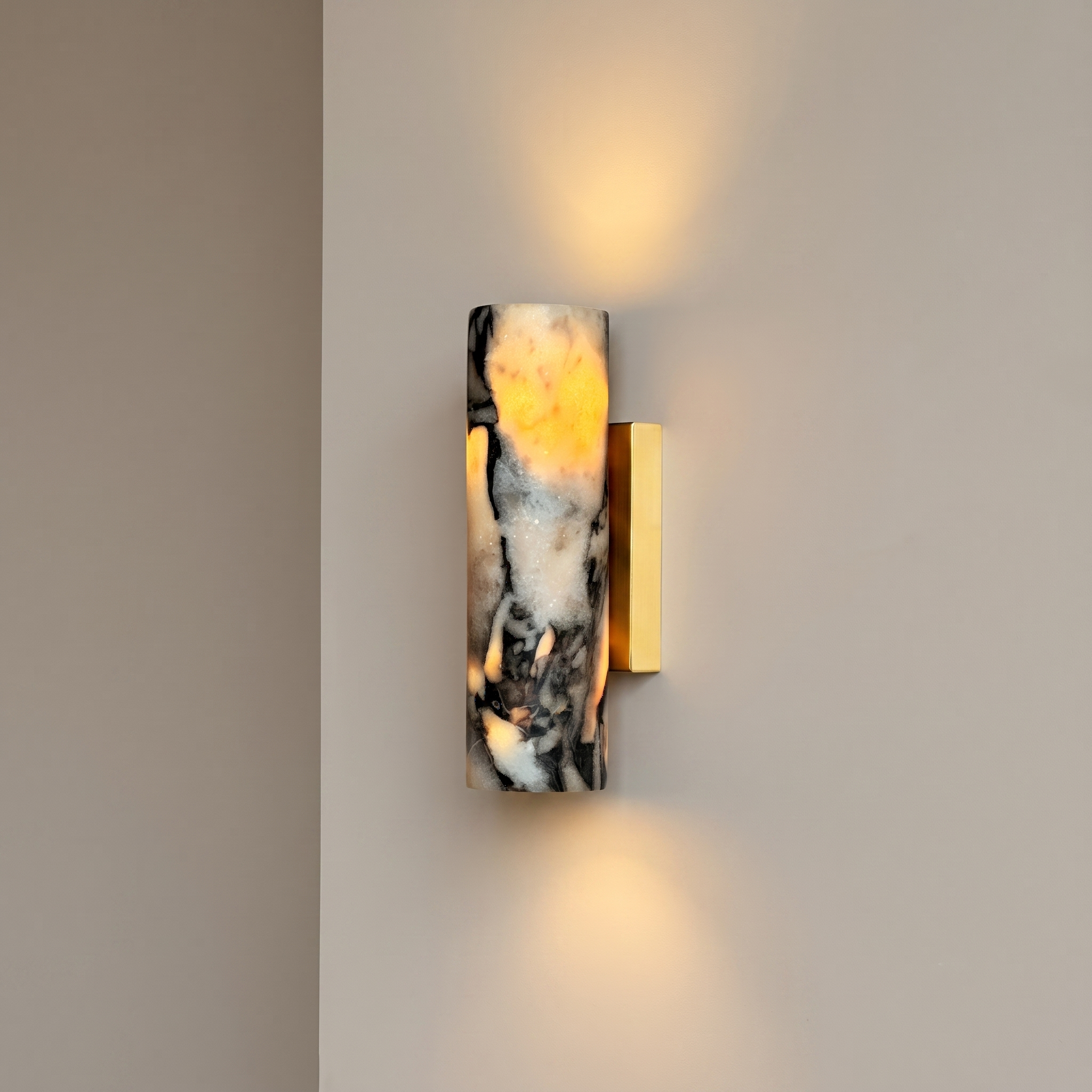 Up and down tube Sconce - Calacatta Viola- A modern wall-mounted sconce with a cylindrical marble shade featuring black and cream veining | IINK Interiors