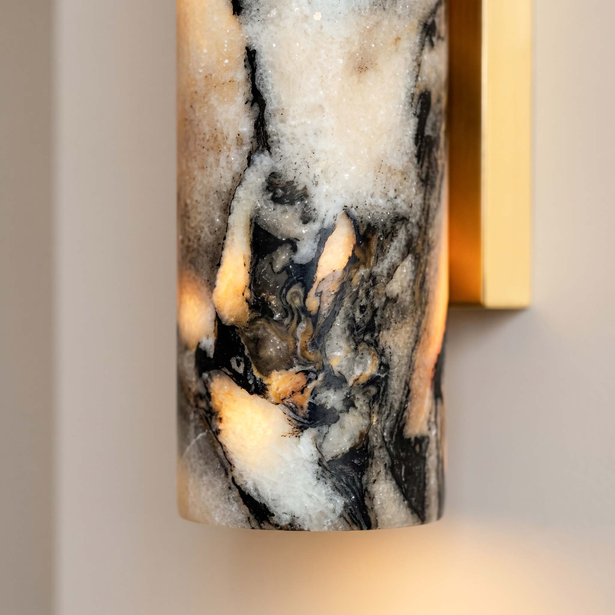 Up and down tube Sconce - Calacatta Viola- A modern wall-mounted sconce with a cylindrical marble shade featuring black and cream veining | IINK Interiors