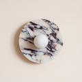 Tondo Planar Sconce - Calacatta Viola- A round white marble candle holder with dramatic black and dark brown veining | IINK Interiors