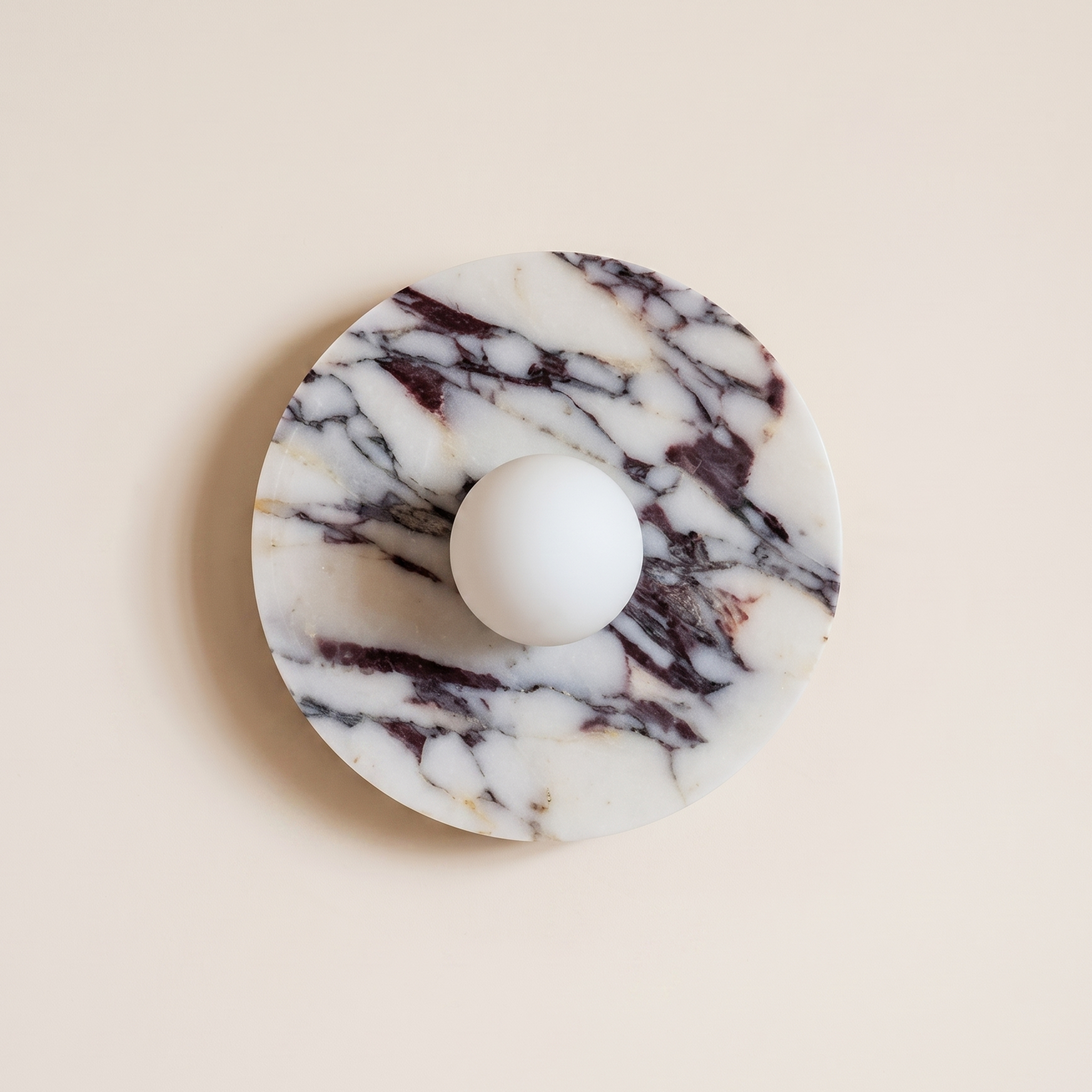 Tondo Planar Sconce - Calacatta Viola- A round white marble candle holder with dramatic black and dark brown veining | IINK Interiors