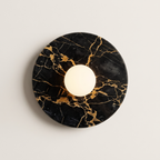 Tondo Planar Sconce - Nero Portoro- A round black marble wall sconce with elegant gold veining | IINK Interiors