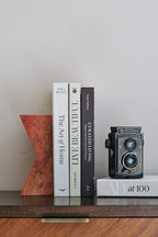 The V Book Stand - Travertine Rosso