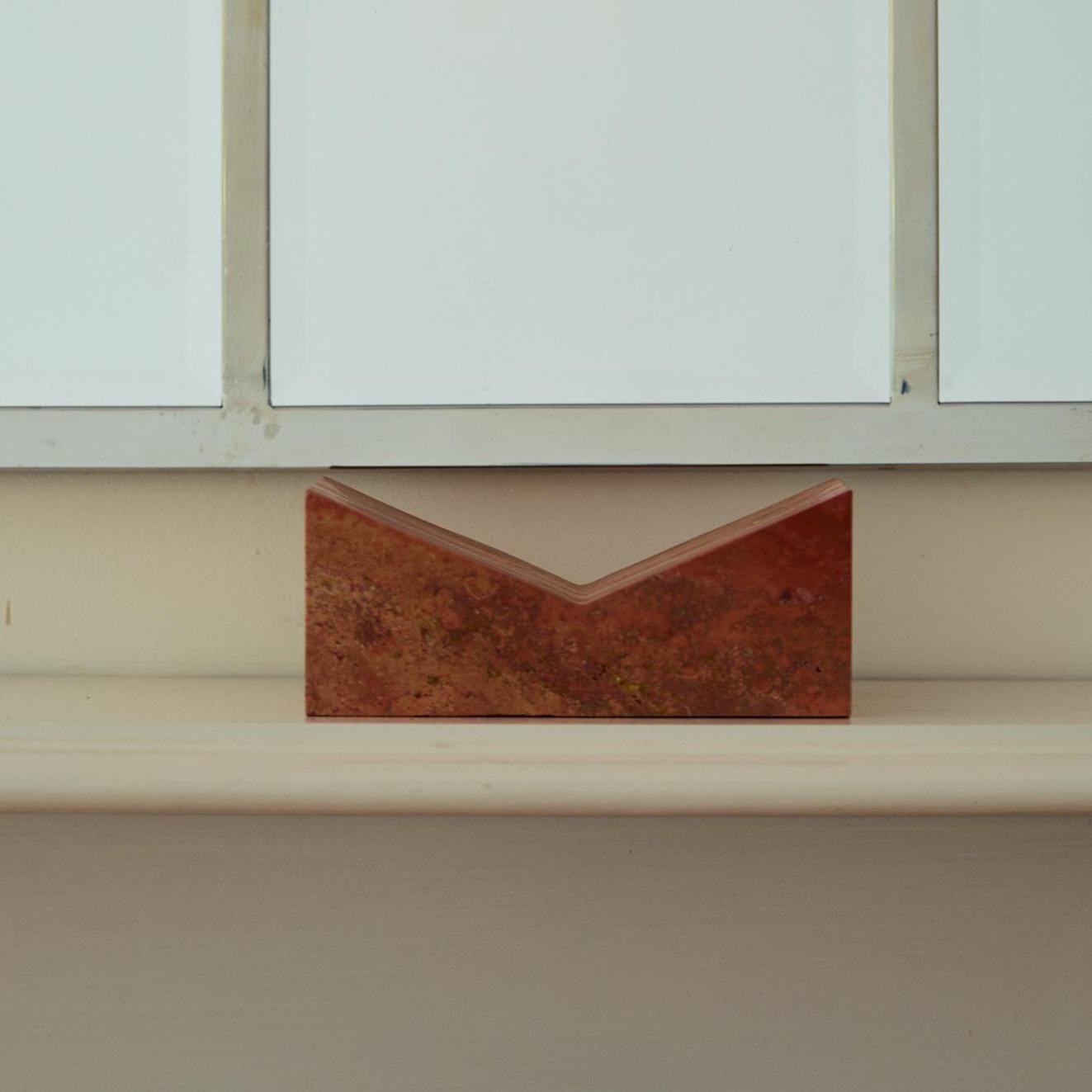 The V Book Stand - Travertine Rosso